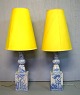 Bjørn Wiinblad (1918-2006), Denmark. Two colossal unique floor lamps in blue-glazed ceramics, decorated with young women surrounded by floral ornamentation. Original yellow screens. Dated 1978.