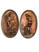 Two charming oval plaques for wall hanging made of 
copper with classic motifs of a woman and a man 
with a hunting dog, Venus and Mars