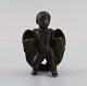 Just Andersen (1884-1943), Denmark. Art deco figure in disko metal. Boy with two 
fish. 1940s.
