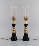 Le Dauphin, France. Two table lamps in glazed stoneware. Beautiful glaze in dark 
green shades with gold. 1960s/70s.
