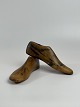 Pair of antique wooden shoes last in size 36. Marks from the shoemaker