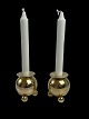 Pair of Swedish ball-shaped brass rods on 
ball-shaped feet