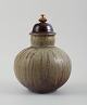 L'Art presents: Arne Bang for Holmegaard. Round Art Deco lidded vase in glazed ceramic with bronze lid. ...