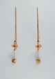 L'Art presents: Skultuna, Sweden, four brass candlesticks for wall hanging.Designed by Pierre Forsell.