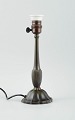 Just Andersen, bordlampe i diskometal.
Model D56.