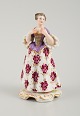 Meissen, lady in fine dress, late 19th century.