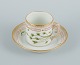 Royal Copenhagen, Flora Danica chocolate cup with matching saucer.