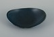 Carl Harry Stålhane Rörstrand, Sweden, large bowl with glaze in dark blue shade.