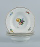 Royal Copenhagen Light Saxon Flower. Four deep plates in hand-painted porcelain.