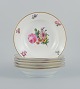 B&G, Bing & Grondahl Saxon flower.
Six deep plates decorated with flowers and gold rim.