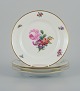 B&G, Bing & Grondahl Saxon flower.
Four dinner plates decorated with flowers and gold rim.