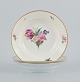 B&G, Bing & Grondahl Saxon flower.
Three deep plates decorated with flowers and gold rim.