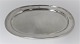 Sasikov. Russia. Saint Petersburg.
Oval silver tray with 4 feet (84). Crowned monogram. Length 24.5 cm. Width 16.5 
cm. Produced 1868.