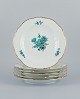 Meissen, Germany, a set of six "Neu Marseille" dinner plates hand painted with 
green flowers and gold trim.