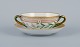 Royal Copenhagen Flora Danica boullion cup with saucer in hand-painted porcelain 
with branch-shaped handles, flowers and gold decoration. 
PROVENANCE : VALDEMARS CASTLE