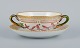 Royal Copenhagen Flora Danica boullion cup with saucer in hand-painted porcelain 
with branch-shaped handles, flowers and gold decoration. 
PROVENANCE : VALDEMARS CASTLE