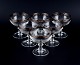 Murano, Italy, six mouth-blown engraved champagne glasses with silver rim.