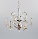 Scandinavian design, metal chandelier with crystals.