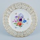 Meissen, Germany, openwork plate hand painted with flowers and butterflies.