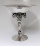 Lundin Antique 
presents: 
Georg 
Jensen. 
Sterling (925). 
Grape bowl. 
Model 263. 
Height 18,7 cm. 
Diameter 18 cm. 
...