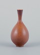 Berndt Friberg (1899-1981) for Gustavsberg, Sweden, miniature ceramic vase with 
glaze in brown shades.