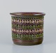 Bitossi, Italy, ceramic herb pot with a geometric pattern and glaze in green, 
brown, and yellow tones.
