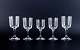 A set of five René Lalique Chenonceaux glasses.
Four red wine glasses and one white wine glass.