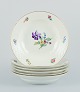 Bing & Grøndahl, Saxon Flower, a set of six deep plates hand-decorated with 
polychrome flowers and gold rim.