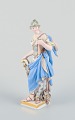 L'Art presents: Meissen, Germany, hand-painted porcelain figurine.