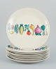 Villeroy & Boch, Luxembourg, eight "Primabella" dinner plates in stoneware 
featuring various vegetable motifs.