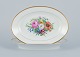 Bing & Grondahl, two oval platters hand-painted with polychrome flower motifs 
and gold trim.