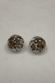 Royal 
Copenhagen Ear 
Clips in Brown 
Flower