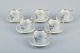 Bing & Grøndahl, a set of six antique coffee cups with high handles and  
saucers. Hand-painted with polychrome flower decoration.