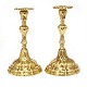 Pair of Rococo brass candlesticks. Circa 1760. H: 23cm