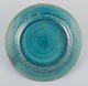 Josef Ekberg for Gustavsberg, Sweden. Large round ceramic dish with green-toned 
glaze and gold rim.