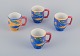 Vietri, Italy. Set of four large ceramic mugs. Decorated with fish and sea 
motifs in a mosaic-like pattern.