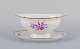 Bing & Grøndahl, Denmark. Hand-painted sauce boat with floral decorations in 
purple and gold trim.