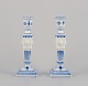 Royal Copenhagen, a pair of Blue Fluted candlesticks.