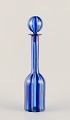 Murano, Italy. Art glass decanter with a striped design.
Blue tones with gold stripes.