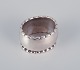Rare and early Georg Jensen napkin ring in 830 silver.