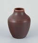 Ingrid and Erich Triller, Sweden.
Unique ceramic vase decorated with brown-toned glaze.