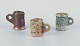Danish studio ceramicist.
Three unique miniature ceramic mugs.
Decorated with various earth-toned glazes.