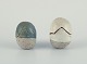 Danish studio ceramicist.
Two egg-shaped unique ceramic sculptures. Divided into two parts.