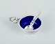 Georg Jensen Cactus. Salt cellar in sterling silver with accompanying salt 
spoon. Interior with royal blue enamel.