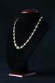 Antik Huset 
presents: 
Beautiful 
and elegant 
gold chain in 
14 carat gold, 
from Evald 
Nielsen. The 
chain has a ...