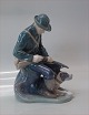 Royal Copenhagen 1087 RC Hunter with dog Chr Th. 20 x 10 cm
