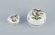 Herend, 
Hungary. Two 
porcelain 
lidded jars 
hand-painted 
...