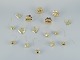 Royal 
Copenhagen 
"Royal 
Christmas". Set 
of 16 brass ...