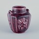 Bode Willumsen for Royal Copenhagen. Ceramic vase with mythological motifs. 
Ox-blood glaze.