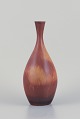 L'Art presents: Carl Harry Stålhane (1920-1990) for Rörstrand, Sweden. Vase in hare's fur glaze. Darkred and ...